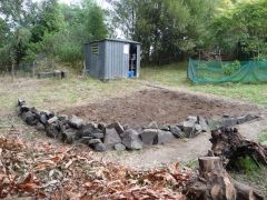 The rock retaining wall from the front